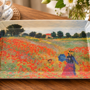 small-tray-monet - Butterflygifts Ltd Decorative rectangular plate with a countryside scene: a woman with a parasol and a child in a red poppy field, on a wooden table.