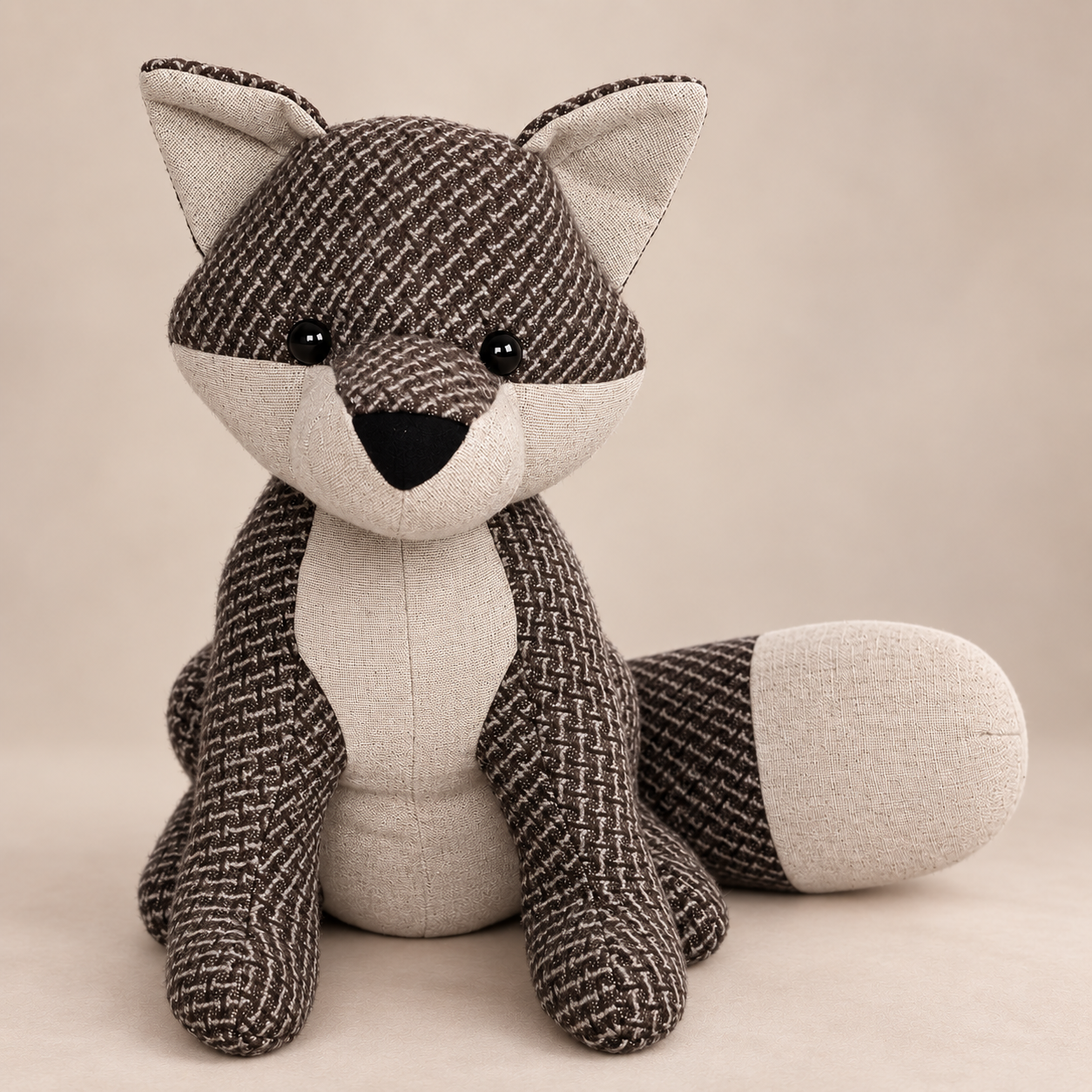doorstopfoxbrownplain - Butterflygifts Ltd Handmade fabric fox plush toy with brown patterned body and beige accents, sitting on a neutral background.