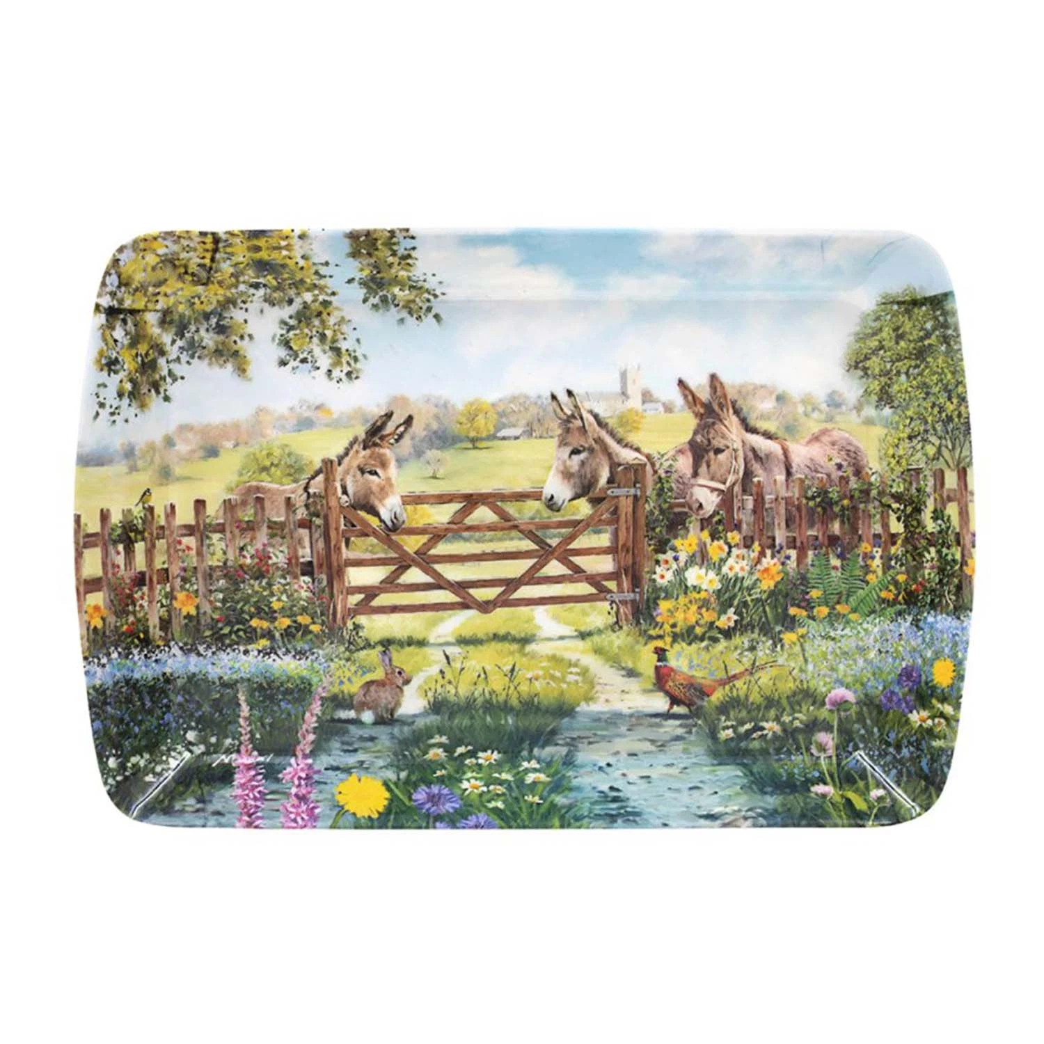 small-tray-donkey - Butterflygifts Ltd Three donkeys lean over a wooden gate in a colorful garden with blooms and a meadow beyond the fence.